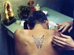 Does George Clooney Have a Butterfly Tattoo