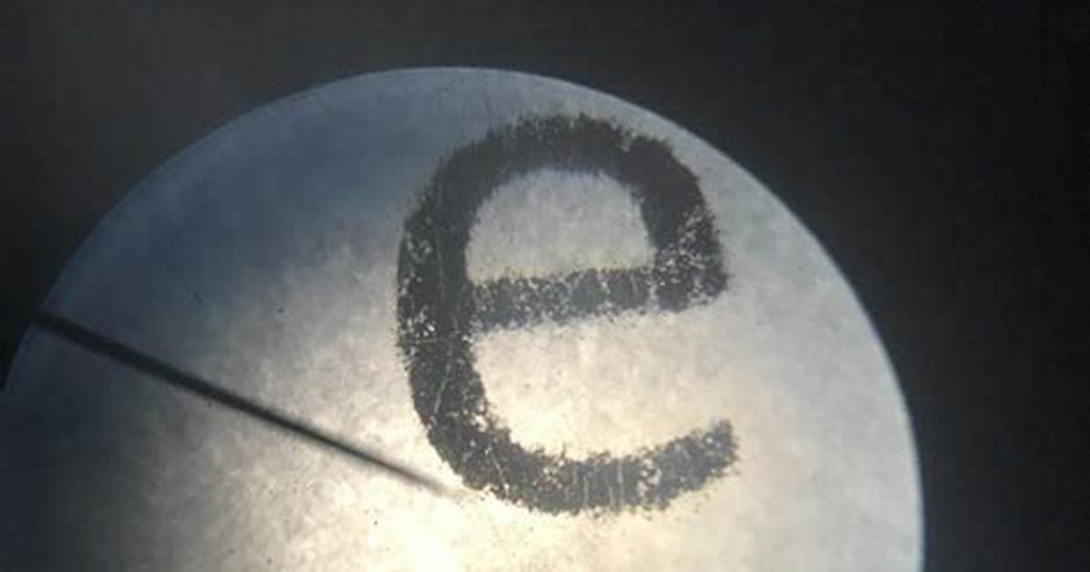 Why Does the Letter E Flip Under a Microscope